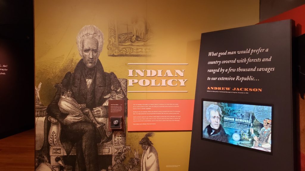 Three-dimensional exhibits at the Jackson Museum highlight his contributions and controversies.