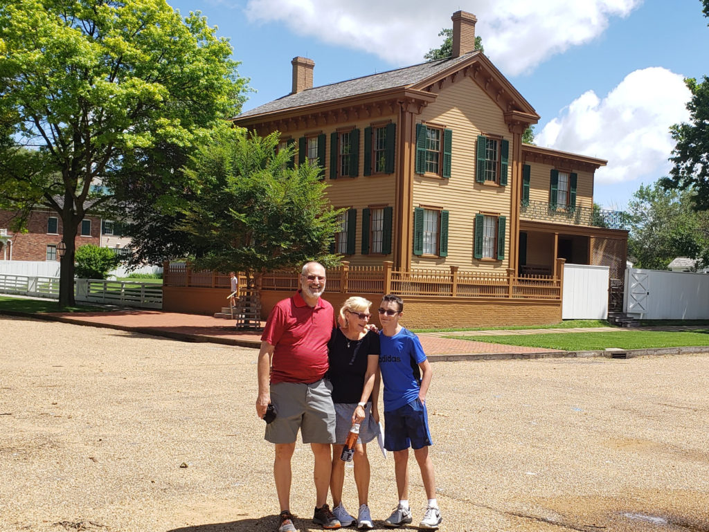 Family photo in front of the Lincoln Home in Springfield, IL.